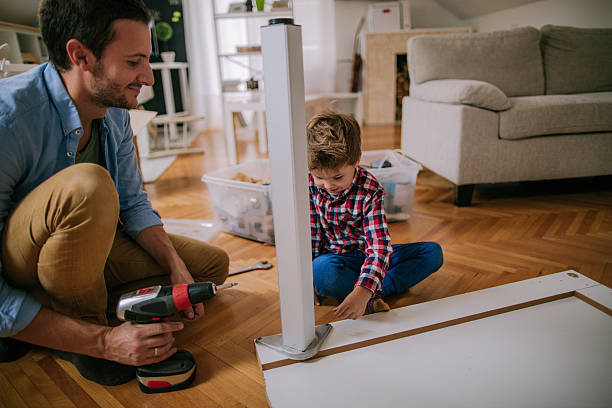 istock Little handyman and his father 623684930