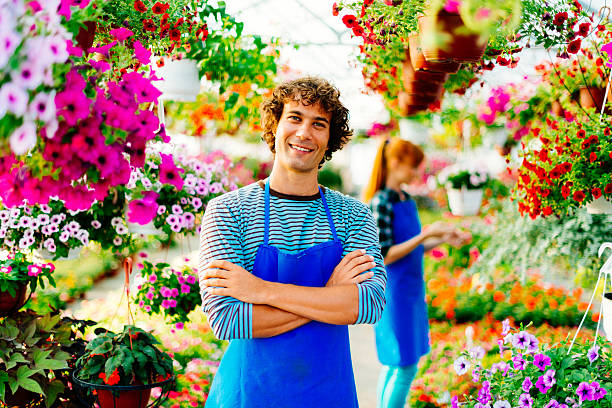 istock Successful entrepreneur with his partner in plant nursery 623687048