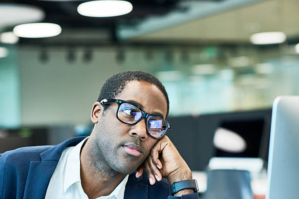istock African American manager looking at screen 623692422