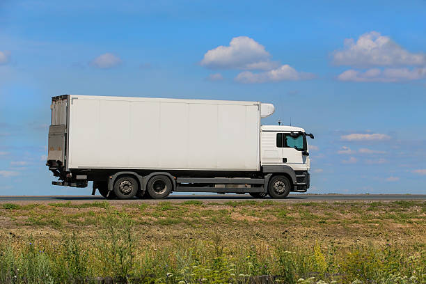 istock truck transports freight on highway 623696300