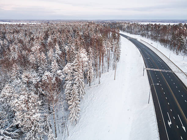 istock winter road intersection in the countryside with a bird's-eye view 623696312