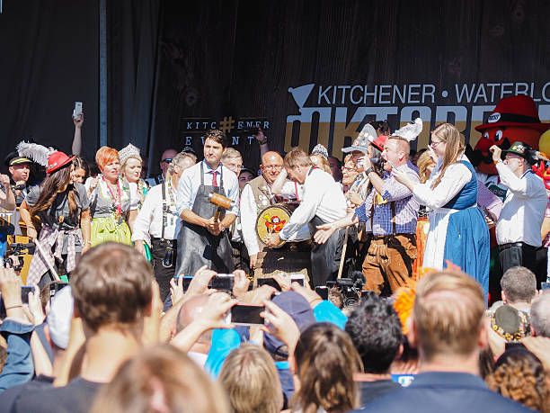 PM Justin Trudeau at Oktoberfest Kitchener, Ontario, Canada - October 7, 2016: Canadian Prime Minister Justin Trudeau prepares to tap the keg to open Oktoberfest. kitchener ontario photos stock pictures, royalty-free photos & images