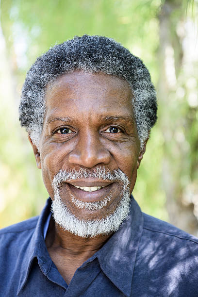 istock Cheerful African American man with grey hair, smiling 623700030