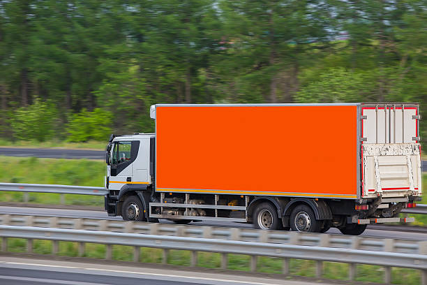 istock truck moves on highway 623700612
