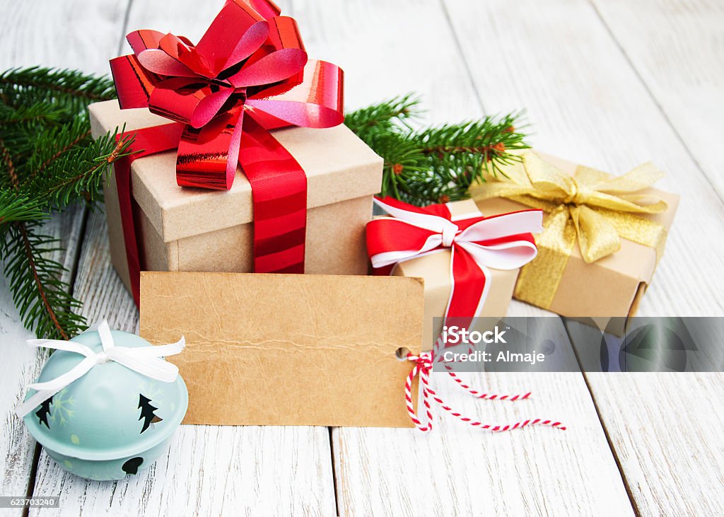 christmas gift box and decorations christmas gift boxes with decorations on a old wooden background Birthday Stock Photo