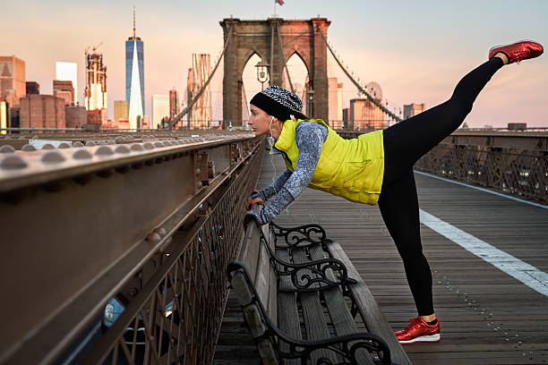 istock Female athlete exercising on the bridge 623704758