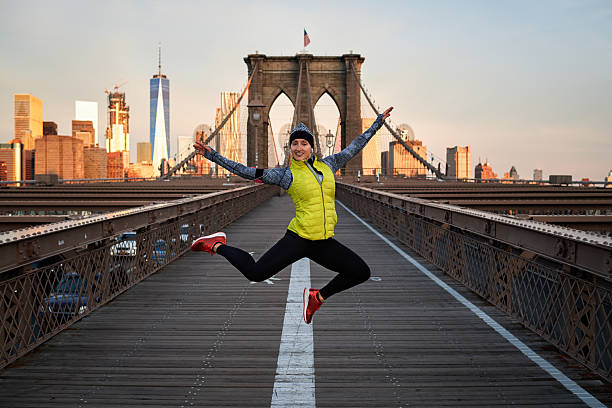 istock Female athlete jumping on the bridge 623704864