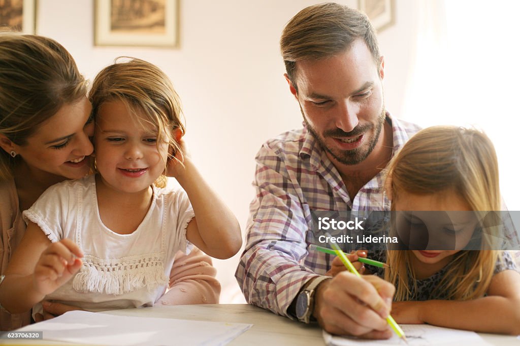 Cheerful family. Family playing at home. Family Stock Photo