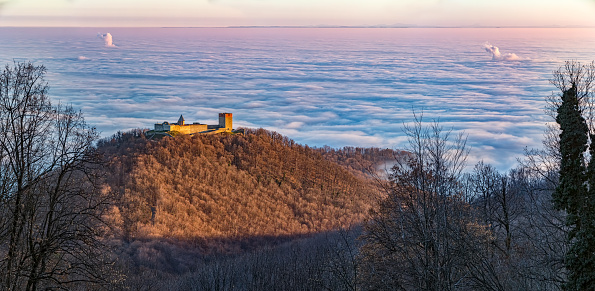 Aerial view of Zagreb over the old town Medvedgrad, capital of Croatia hidden beneath the clouds.