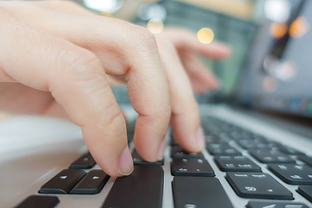 istock Close-up of hands typing on a keyboard 623710012