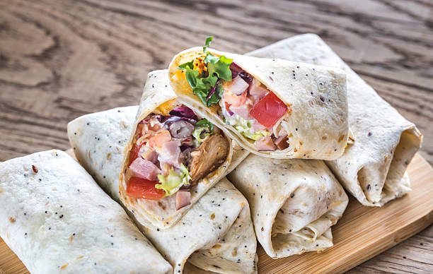 istock Chicken burritos on the wooden background 623712456