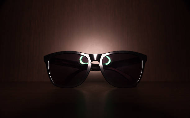 istock black Sunglasses on wood floor with led ring light reflect 623714406