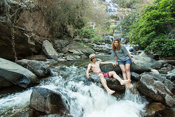 The lover at Mae Ya Waterwall, Inthanon National Park, Chiangmai, Thailand