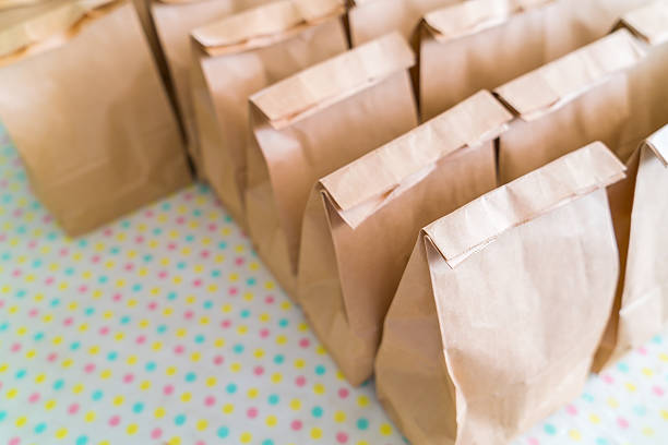 istock Rows of brown paper bags 623716768