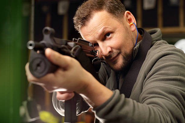 istock Sport shooting range. The man at the shooting range. 623742022