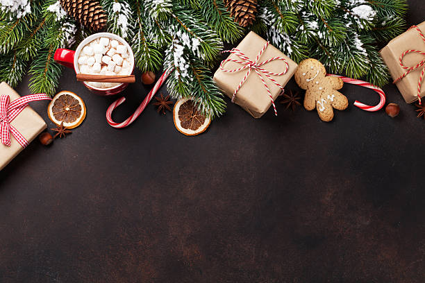 istock Christmas fir tree, hot chocolate and marshmallow 623745370