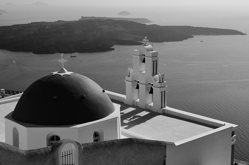 Black and white photo of Santorini Island sea view.