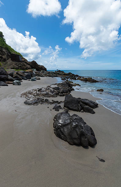 istock Large Rocks on the Sand Leading to the Sea 623753822