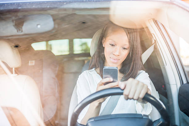 istock African American Women Texting In A Car 623756338