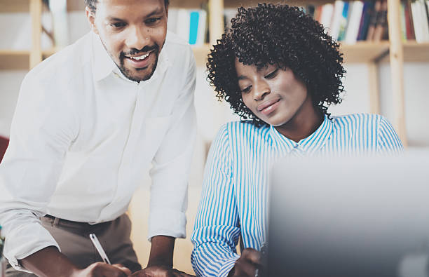 istock Group of young coworkers working together in a modern office 623760280