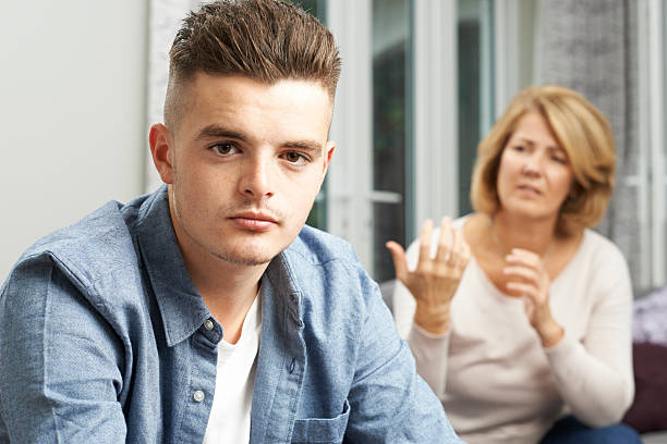 istock Mother Arguing With Teenage Son 623762846