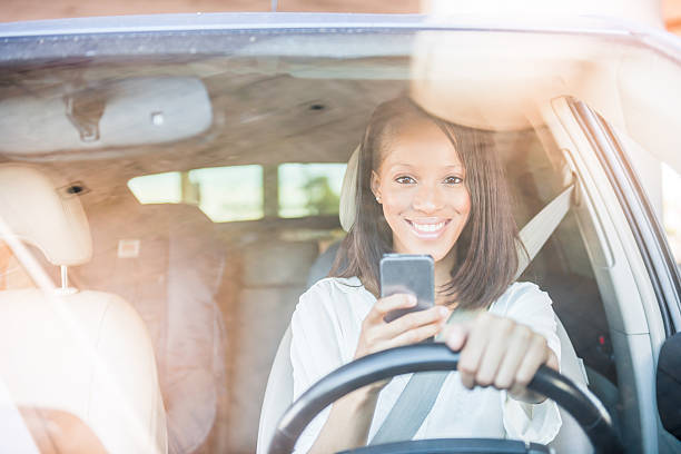 istock African American Women Texting In A Car 623763256