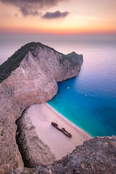 Landscape view of famous Shipwreck (Navagio) beach on Zakynthos Landscape view of famous Shipwreck (Navagio) beach on Zakynthos, Greece ionian sea photos stock pictures, royalty-free photos & images