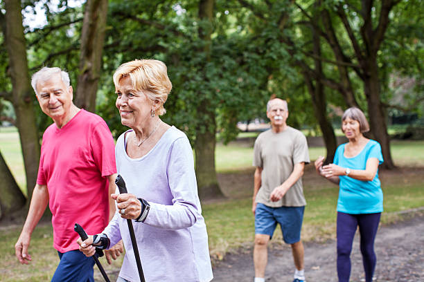 istock Senior people walking in a park 623766296