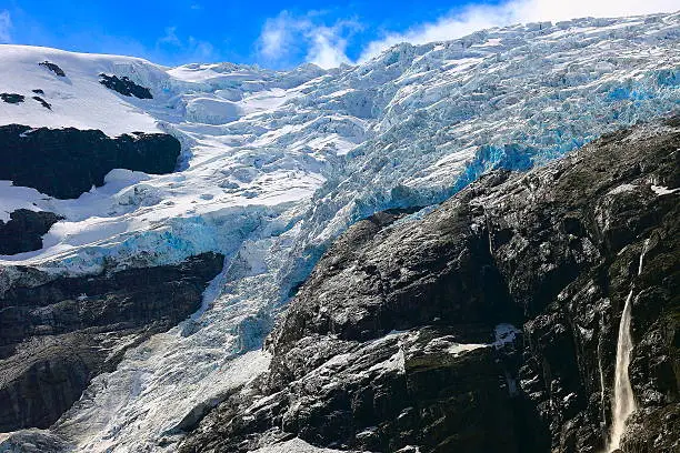 Jostedalsbreen paradise: sunny Briksdal Glacier and cascade - Jostedal, Norway, Scandinavia