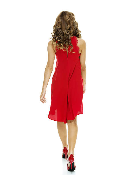 istock Rear view of woman walking 623768666