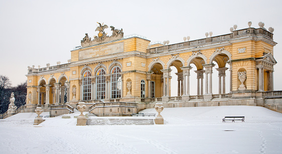 Vienna, Austria - January 15, 2013: Vienna - Gloriette from gardens of Schonbrunn palace in winter. Gloriette was built in year 1775.