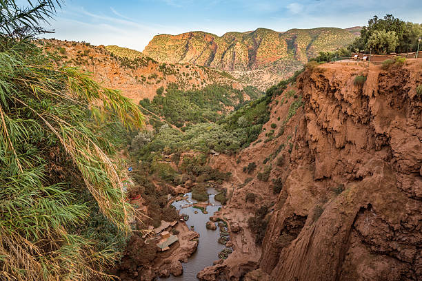 The land around waterfalls Ozoud in Morocco is characterized by red rock.