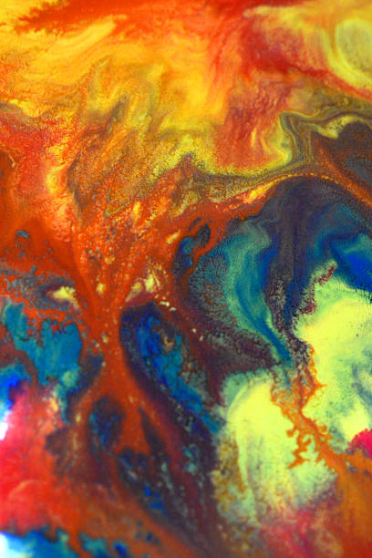 istock Red, green, blue, yellow colors mixed fluid macro 623770538