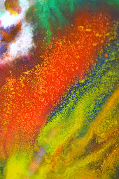 istock Red, green, blue, yellow colors mixed fluid macro 623771082