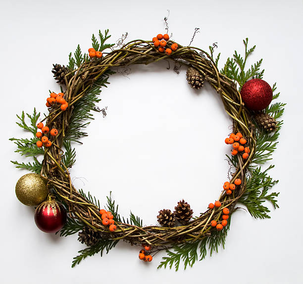 istock Wreath of vines with decorative ornaments, thuja, rowanberries. Flat lay 623773626