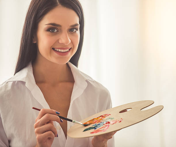 istock Attractive female artist 623774058