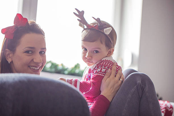 istock Mother and baby having christmas fun 623774114