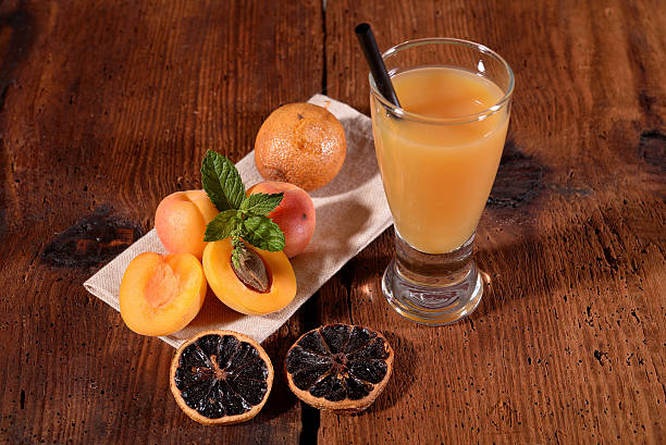 istock Glass with apricot juice 623777136