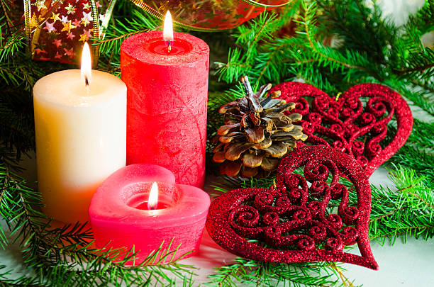 istock New Year and Christmas background with candles decorated Christmas tree 623777310