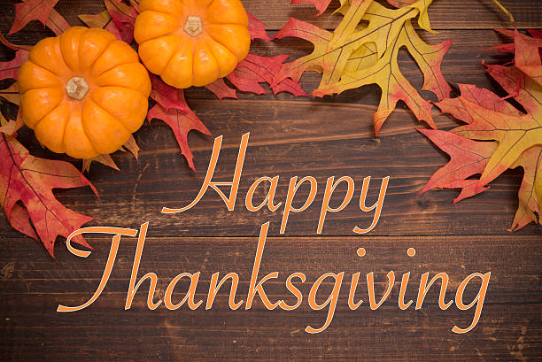 istock Thanksgiving Celebration - Autumn leaves and pumpkins 623777620