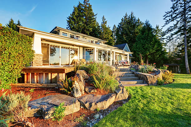 istock Back yard of waterfront house at sunset 623777946
