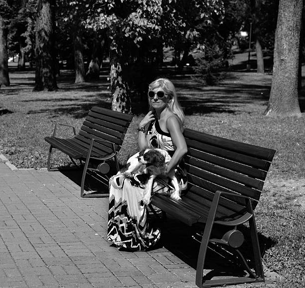istock Grayscale Woman Holding Her Dog 623778842
