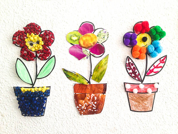 istock Three colorful pots made with recycled material by nursery child 623781468