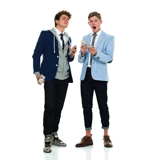istock Brothers holding money 623783958