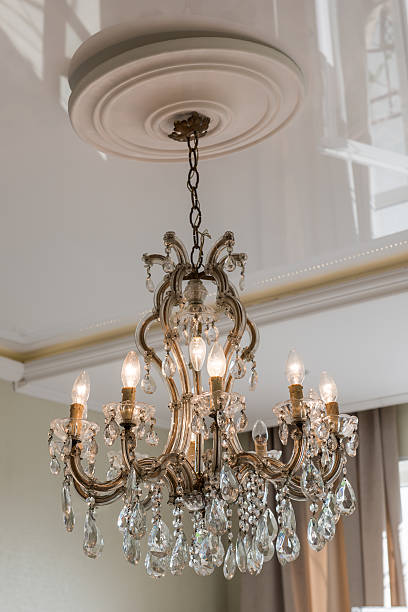 istock Beautiful crystal chandelier in ambient light 623823492