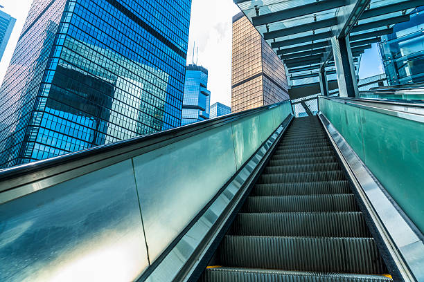 istock escalator in Hong Kong downtown district 623824110