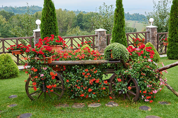 Bicycle with flowers in the garden.