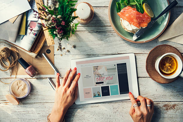 istock Woman shopping online on tablet 623826214