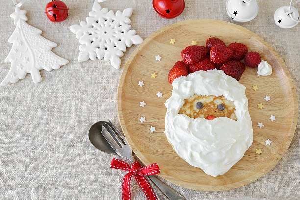 istock Fun homemade santa pancake breakfast for kids,copy space backgro 623826534