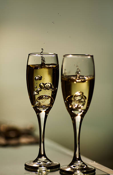 Gold ring in champagne close up